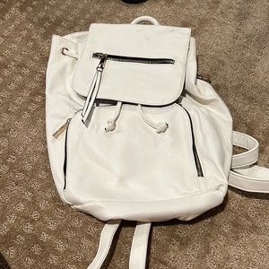 Also white mini back bag